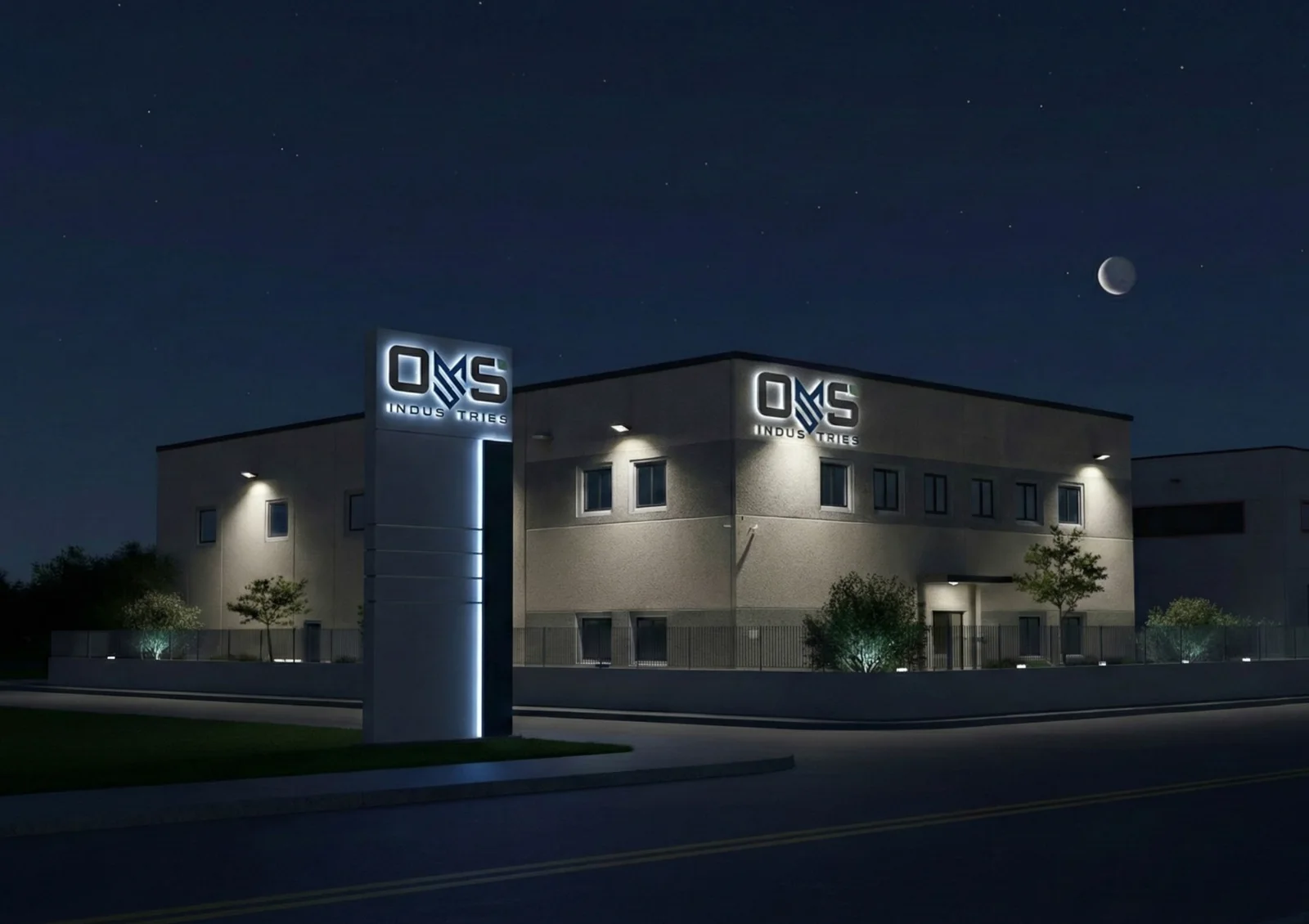 Sede OMS Industries di notte con insegne luminose